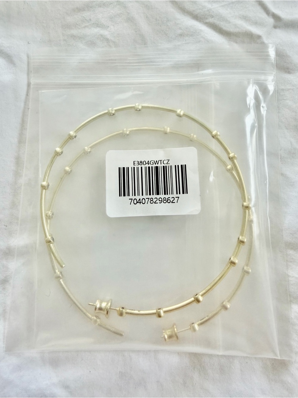 Melinda Maria Gold Hoop Earrings with Purple Pouch - Picture 4 of 4
